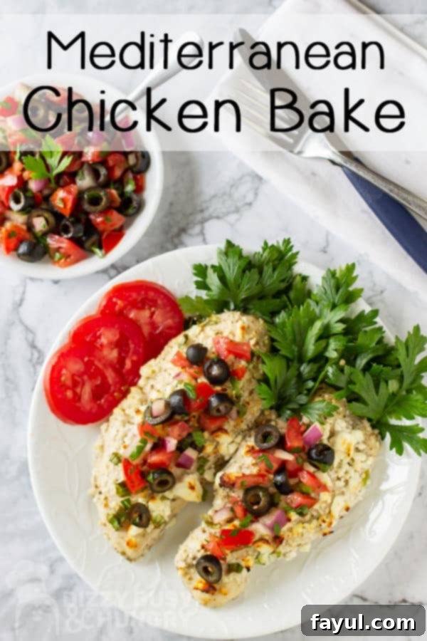 Overhead view of Mediterranean chicken bake with a side of sliced tomatoes, greens, and salsa on a white plate.