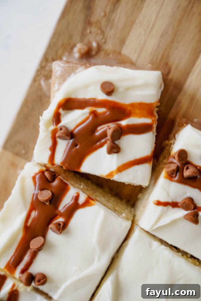 Pouring the cinnamon filling into the poked cake.