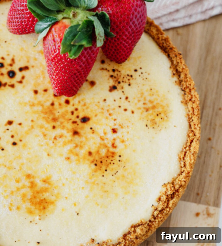 Crème brûlée cheesecake with a slice removed