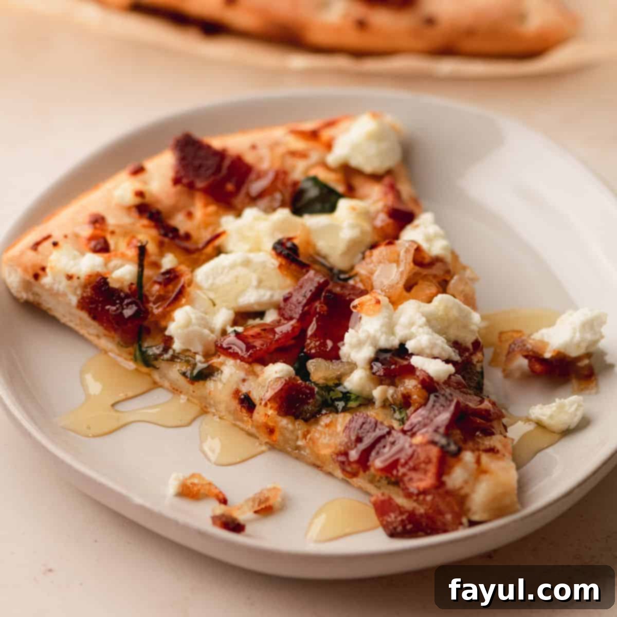 Caramelized Shallot and Bacon Goat Cheese Pizza, showcasing a delightful combination of savory and sweet toppings.