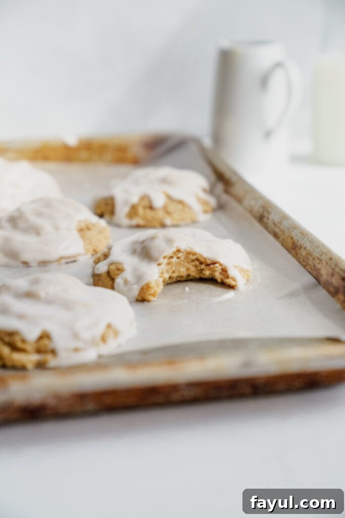 Iced Oatmeal Cookies on a cooling rack