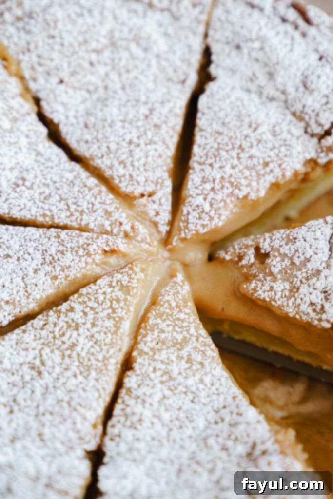 Caramel Gooey Butter Cake being cut into squares