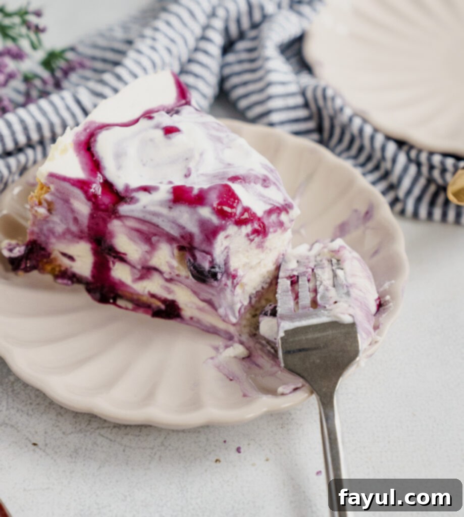 Creamy cheesecake filling being mixed