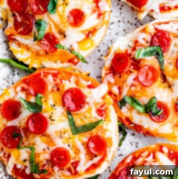 The Best Homemade Air Fryer Bagel Bites 9 Overhead shot of bagel bites on white tray.