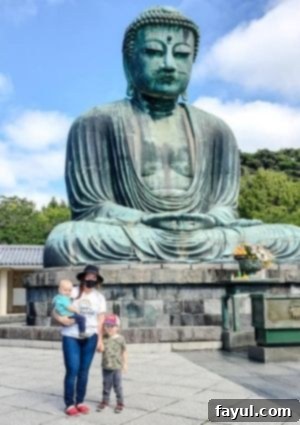 A heartwarming image of the author, Caitlyn Erhardt, enjoying time with her children in Kamakura, Japan, illustrating family and travel.