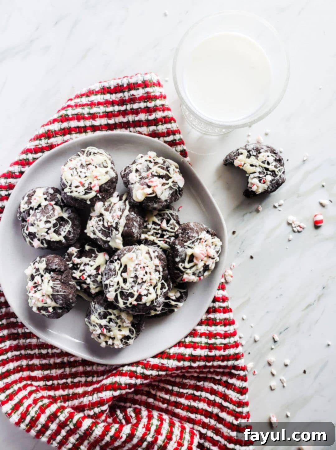 These Chocolate Cake Cookies with White Chocolate Peppermint Sprinkle is the perfect Christmas cookie recipe. These cookies use a boxed cake mix, cream cheese, butter and of course dark chocolate chips for the best flavor combination. You will love this easy baking recipe for the holiday season! #holidays #Christmas #Cookies #recipe #baking
