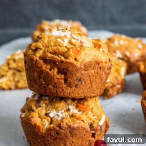 Homemade Vegan Morning Glory Muffins 4 This Morning Glory Muffins Recipe is the best easy, healthy, and quick breakfast of brunch! Filled with carrots, cranberries, apples, applesauce and nuts you will love this clean eating favorite perfect for kids and adults! #Vegan #CleanEating #Healthy #Food #recipe