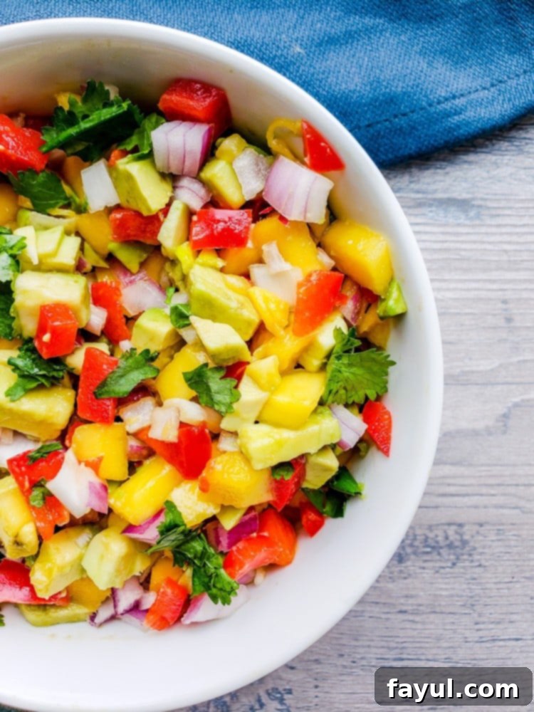 Easy Healthy Mango Avocado Salsa 36 A bowl of fresh mango avocado salsa, a perfect healthy vegan dip for summer. Ideal with tacos or tortilla chips.