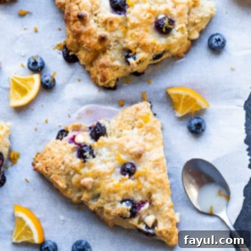 Lemon-Kissed Blueberry White Chocolate Scones 3 These Blueberry White Chocolate Scones with Lemon Glaze are the best sweet breakfast or afternoon tea treat. This recipe with be your family's new favorite!