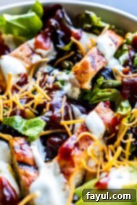 Smoky BBQ Chicken Salad with Creamy Buttermilk Ranch 5 Close-up shot of the vibrant and fresh BBQ Chicken Salad, highlighting the textures of the ingredients and the rich colors, making it look incredibly appetizing.