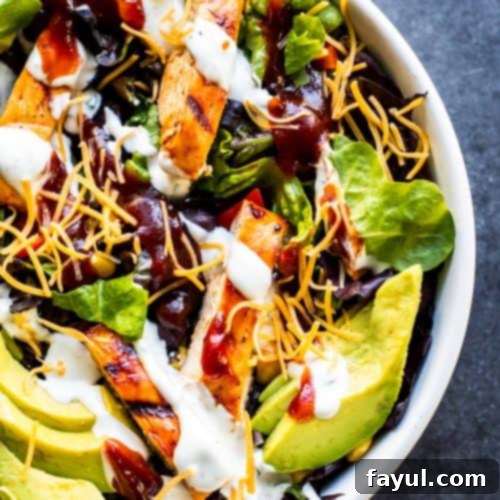 Smoky BBQ Chicken Salad with Creamy Buttermilk Ranch 8 This Grilled BBQ Chicken Salad with Homemade Buttermilk Ranch Dressing is the best summer grill recipe for friends and family! This healthy meal is tasty, a little spicy and works great as a side dish or main dish. Add your favorite toppings like avocados, cheese, black beans, corn, egg, or tomatoes for the perfect touch! Don't have a grill? No problem you can make the chicken on the stove top as well! #salad #BBQ #chicken #recipe #food #healthy #under30minutemeal