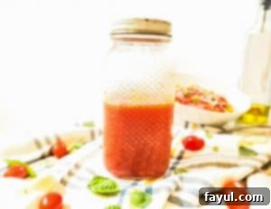 Marinara sauce in a glass mason jar. 