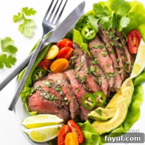 Perfectly grilled easy carne asada, sliced and ready to serve, a flavorful and quick Mexican-inspired dish.