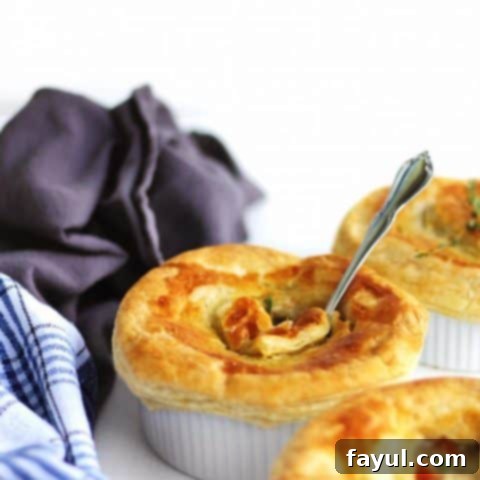 Hearty and creamy vegan pot pies topped with flaky crust, perfect for a comforting family meal.